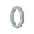 A half-moon shaped bangle made of real, untreated lavender with pale green jadeite.