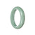 A high-quality, pale green Burma Jade Bangle in a 58mm half moon shape, made by MAYS™.