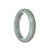 A lavender jadeite bangle with a half-moon shape, measuring 62mm in diameter.