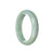 A stunning pale green and lavender Burmese Jade bangle with a half moon shape, measuring 59mm.