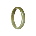 A half moon-shaped jade bracelet in a certified natural brownish olive green color with a prominent brown patch.