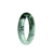 A half-moon shaped pale green and olive green Burma Jade bangle bracelet, untreated and genuine.