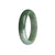 A stunning grey and green jade bangle with a half moon shape, crafted from high-quality Grade A Burmese jade.