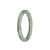 A small round grey and white Burmese Jade bangle, certified as Grade A quality.