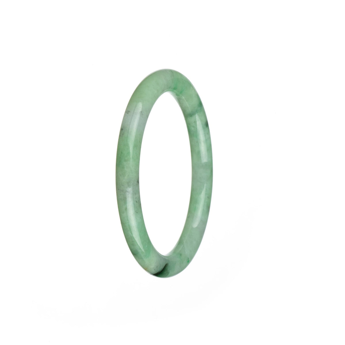 A close-up view of a small, round Burma jade bangle with a vibrant green color and light green spots.