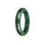 An elegant dark green jade bangle with a half moon shape, certified as Grade A Green by MAYS GEMS.