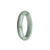 A half-moon shaped genuine white jade bracelet with green accents, untreated and traditional in style, measuring 54mm. A premium accessory from MAYS™.