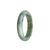 A half moon-shaped jade bangle bracelet featuring genuine Grade A whitish grey jade with hints of green and yellow.