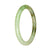 A small, round apple green Burma jade bangle with a real grade A pattern.