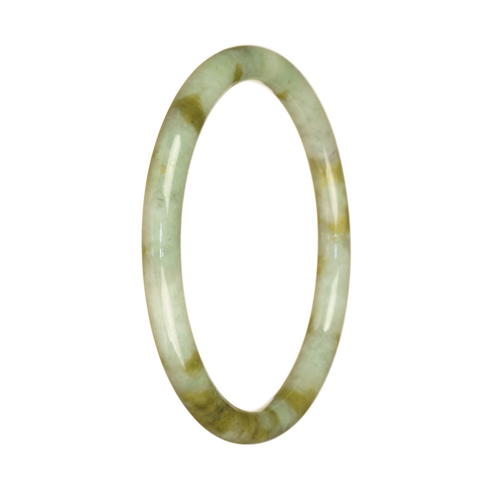 A close-up image of a small, round jade bangle in shades of white and brown. The bangle is crafted from high-quality Grade A jade, giving it a distinct and luxurious appearance.