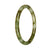 A half moon-shaped bangle bracelet made of genuine untreated Burma jade, featuring a beautiful green and white pattern.