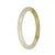 Image of a petite round jade bangle bracelet, featuring a beautiful blend of white and olive green colors. This authentic Grade A traditional jade bracelet exudes elegance and timeless style. Perfect for adding a touch of sophistication to any outfit.