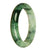 A beautiful green and white patterned Burmese jade bangle bracelet in the shape of a half moon, measuring 63mm.