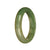 A close-up image of a beautiful green jade bangle bracelet with a half-moon shape, measuring 51mm in diameter. The bracelet is made of real Type A jade and features a smooth and polished surface. The vibrant green color of the jade is captivating. The bangle is a product of MAYS™, a trusted brand known for their high-quality jewelry.