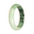 A beautiful jade bangle bracelet with a pale green and green pattern, crafted from genuine Burmese jade. The bracelet features a 55mm half moon shape. Perfect for adding a touch of elegance to any outfit.
