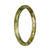 A close-up image of a petite round Burmese jade bangle bracelet with a beautiful green and brown pattern. The bracelet is untreated and authentic, showcasing the natural beauty of the jade.
