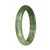 An oval-shaped certified Grade A Green Pattern Jade Bangle Bracelet, measuring 59mm. Made by MAYS GEMS.
