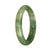 A close-up image of a green jade bangle bracelet with a natural pattern. The bracelet is oval in shape and measures 59mm in diameter. It is made of high-quality jadeite jade and is sold by the brand MAYS.