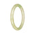 A small round pale green jade bangle bracelet, crafted from high-quality Grade A traditional jade.