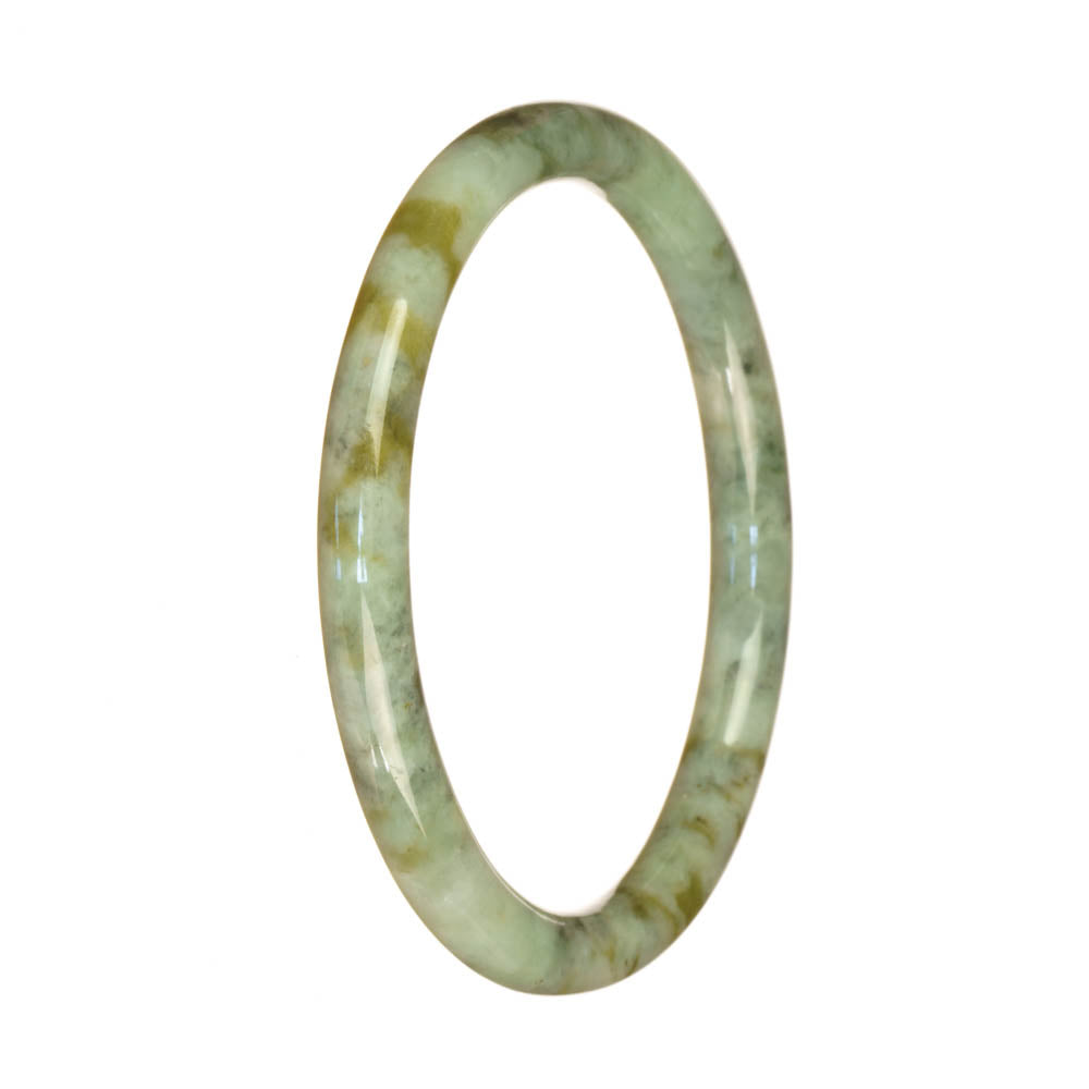 A close-up image of a small round jade bangle bracelet with a beautiful green and brown pattern.