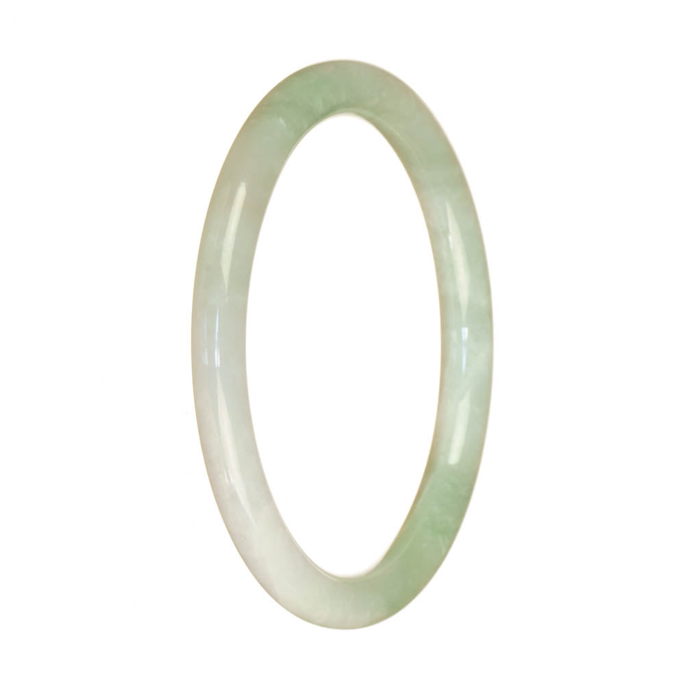 A close-up of a delicate white traditional jade bracelet, featuring a small round shape and a Type A quality. The bracelet has a polished surface and exudes elegance and refinement.