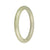 An elegant, petite round pale green jade bangle bracelet, certified as untreated, showcasing traditional beauty.