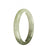 A beautiful, high-quality jade bangle bracelet in pale green and olive green tones, featuring a half moon shape. Perfect for adding a touch of elegance to any outfit.