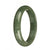 A half-moon shaped green jade bangle bracelet, made from genuine untreated jade.