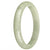 A close-up image of a vibrant green jade bangle bracelet with a smooth, polished surface. The bracelet is in the shape of a half moon and measures 83mm in diameter. It exudes an aura of elegance and natural beauty.