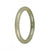 A small round olive green jade bracelet with a traditional design, perfect for adding a touch of elegance to any outfit.