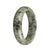 A close-up image of a genuine Grade A grey pattern jade bangle. The bangle features a half moon shape and measures 59mm in diameter. It is being sold by MAYS GEMS.