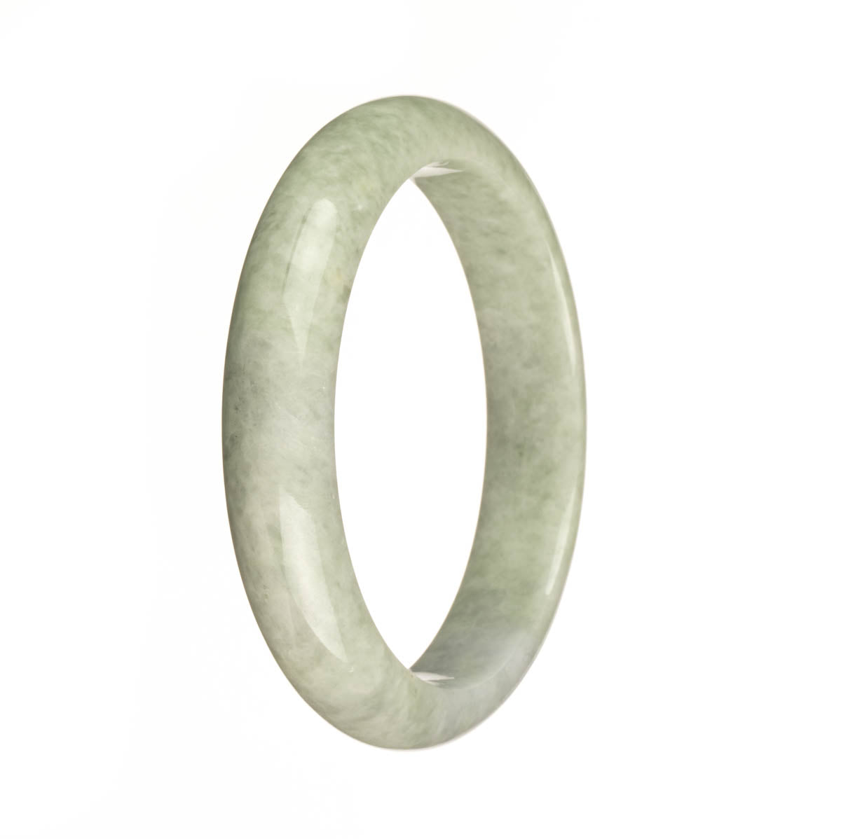 A half moon shaped bangle bracelet made of genuine untreated green Burmese jade with a lavender patch.