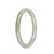 An image of a small, round, traditional jade bangle. It is white in color and has a certification of being untreated. The bangle is petite, measuring 56mm in diameter. It is a product of MAYS™.