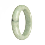 A genuine green jade bangle with a half moon shape, measuring 57mm in size. Perfect for adding a touch of traditional elegance to any outfit.