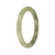 A beautiful light grey and pale green jade bangle with olive green patterns, in a petite round shape, perfect for adding a touch of elegance to any outfit.