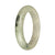 A jade bangle bracelet with a half moon design, featuring genuine Type A greyish white jade with deep green patterns.