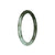 An olive green and white jadeite jade bangle, 61mm in size, with an authentic grade A quality. Designed in a petite round shape, it is a beautiful piece by MAYS™.