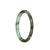 A small, round jadeite bangle in natural shades of greyish white and white, with beautiful olive green patterns.