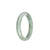 A light grey traditional jade bangle with pale green and brown spots, certified untreated. The bangle is in a half-moon shape, measuring 54mm in size. Offered by MAYS.