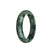 A half moon-shaped traditional jade bracelet with genuine, high-quality Grade A green jade. It features dark green and light brown patterns, creating an elegant and timeless design. Perfect for adding a touch of natural beauty to any outfit.
