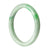A round, genuine Grade A Green Jadeite bangle measuring 63mm, offered by MAYS GEMS.