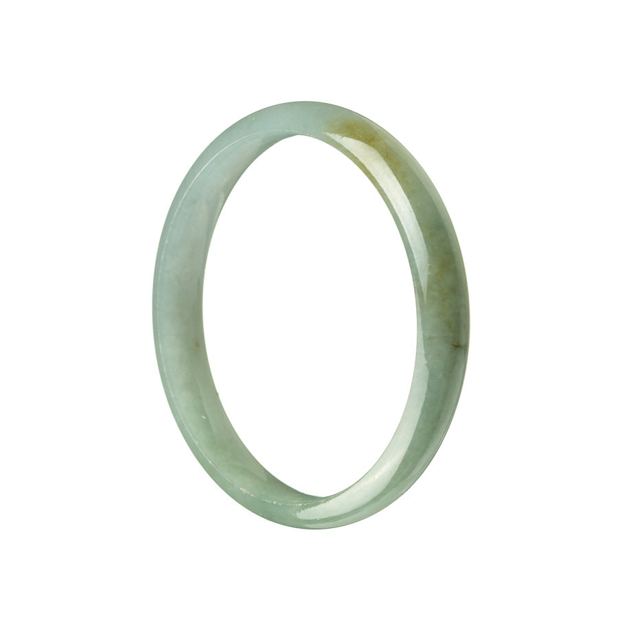 A close-up photo of a beautiful green jadeite jade bracelet in the shape of a half moon, measuring 54mm in diameter. It is a genuine and natural piece, crafted with precision. The bracelet reflects a stunning shade of green and has a luxurious and timeless appeal.