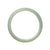 A half-moon shaped bangle made of real untreated pale green Burma Jade, measuring 56mm in size.