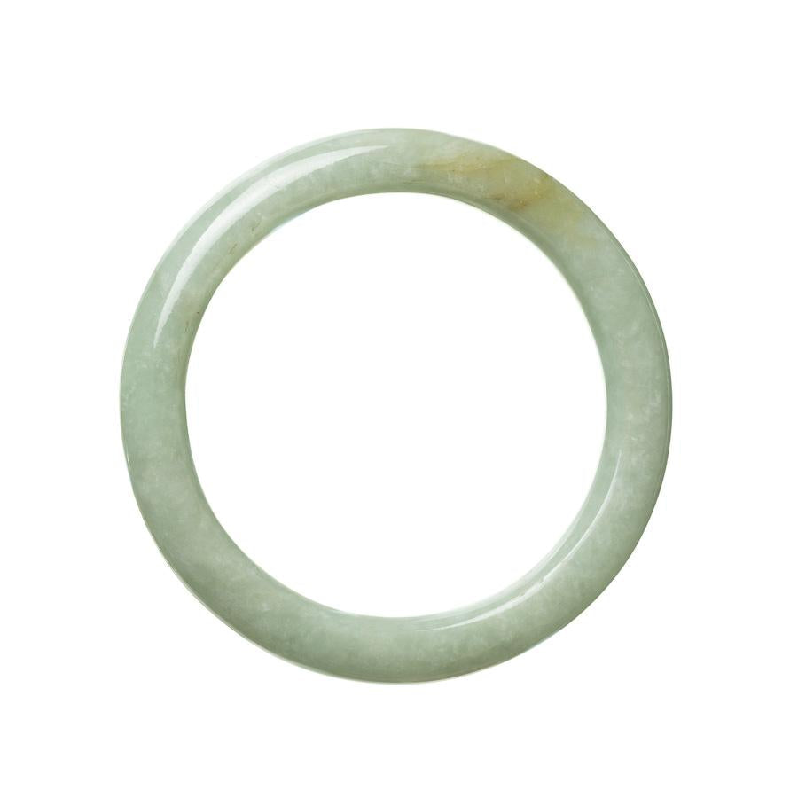 A close-up view of a beautiful green jadeite bracelet with a semi-round shape, measuring 59mm in diameter. The bracelet is made of high-quality grade A jadeite, known for its vibrant green color and natural beauty. It is a stunning piece of jewelry crafted by MAYS™.
