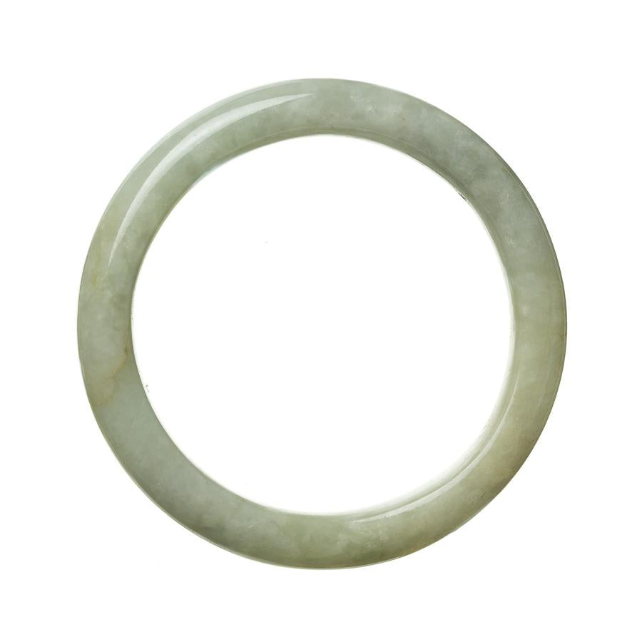A light green Burmese jade bangle with a semi-round shape, measuring 59mm in size. Created with authentic Grade A jade, this exquisite piece is from the MAYS™ collection.