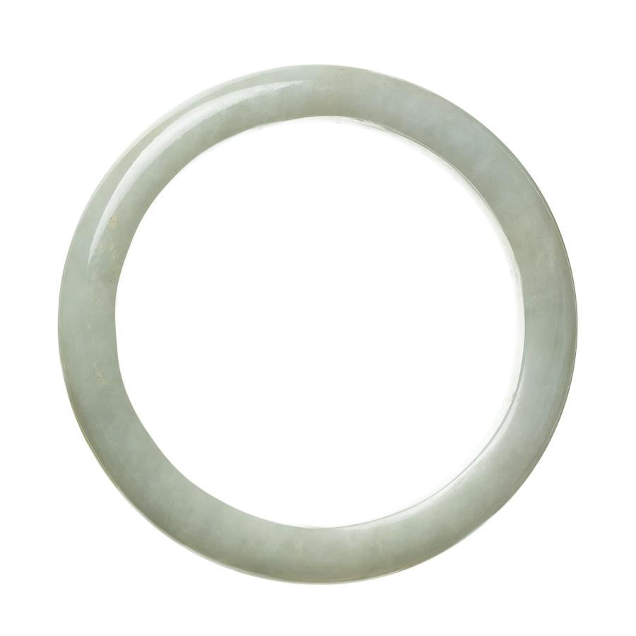 A pale green Burma jade bangle bracelet with a semi-round shape and a genuine untreated finish, measuring 64mm in size.