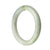 A close-up photo of a pale green jade bracelet with a semi-round shape, measuring 56mm. The bracelet is certified as Type A jade and is part of the MAYS™ collection.
