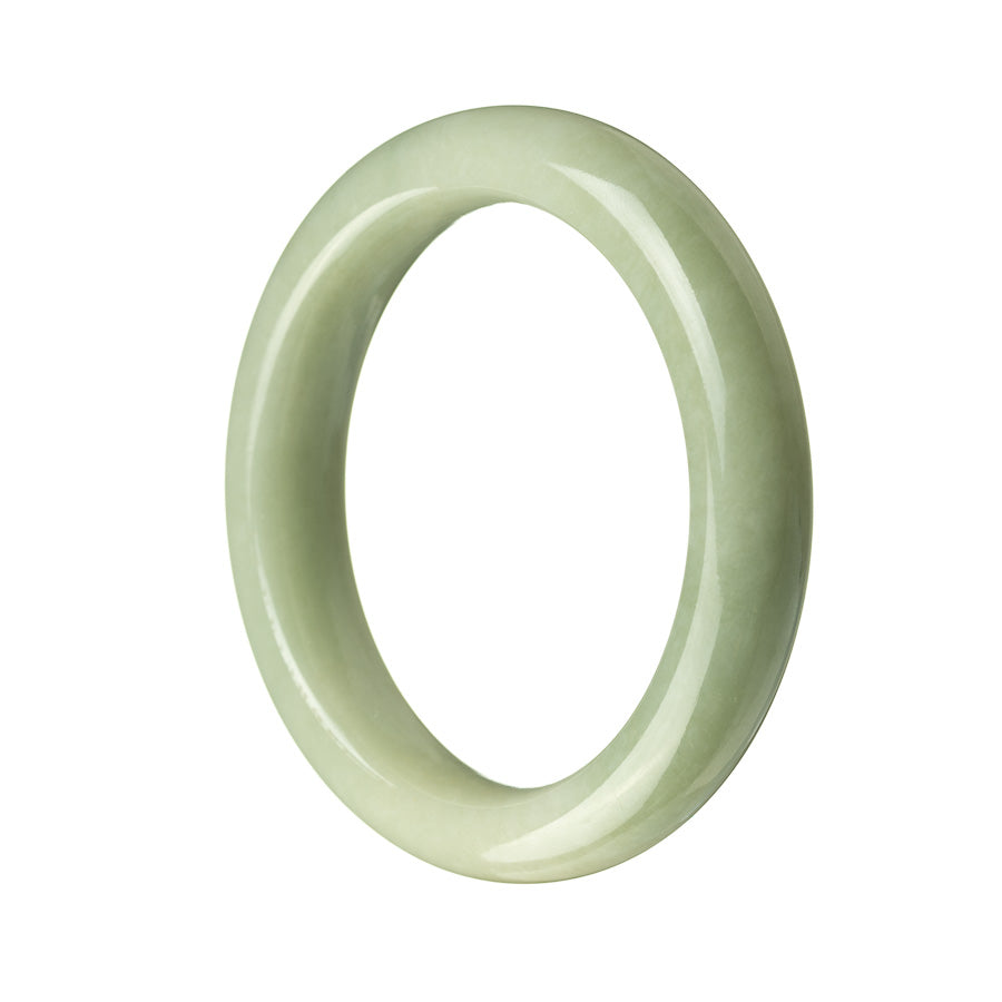 A semi-round green jadeite bracelet, measuring 54mm in size. Crafted from authentic Grade A jadeite, this bracelet showcases the natural beauty and elegance of jadeite. Perfect for adding a touch of sophistication to any outfit.