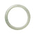 A semi-round, pale green traditional jade bangle, 63mm in size, with genuine Type A quality. Designed by MAYS™.