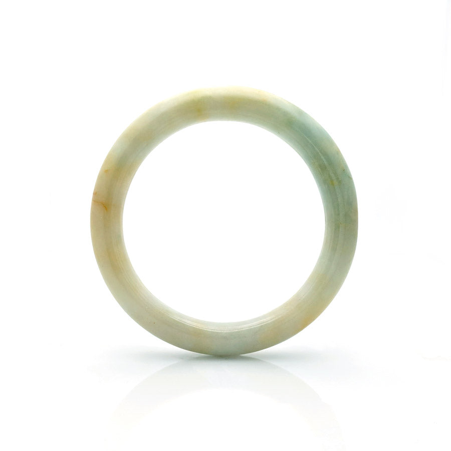 A pale green jade bangle with a semi-round shape, measuring 57mm in size. A genuine and untreated piece of jade from MAYS.